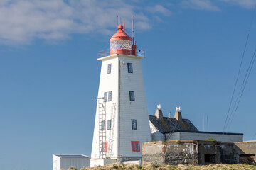 Fototapeta na wymiar The view of the lighthouse at Nature Reserve on Hornoya Island, Varanger Penisula, Norway.