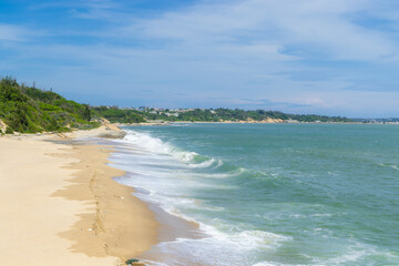 Beautiful sand beach with blue sky