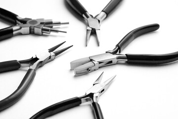 black and white effect on a pair of tweezers for jewelry and crafts.