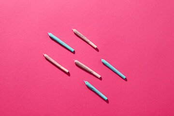 Top of cannabis rolled joints isolated on pink