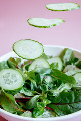 salad levitation with cucumber and lettuce