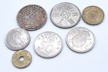pesetas spanish old coins on white background