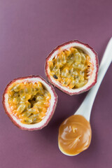 Passion fruit and spoon with caramel