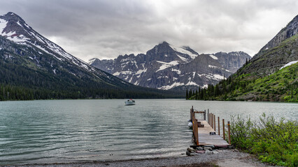 Glacier National Park Mountain lake with a boat