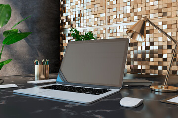 Close up of creative designer desktop with empty laptop screen, lamp, supplies various other objects and shiny golden tile wall background. 3D Rendering.