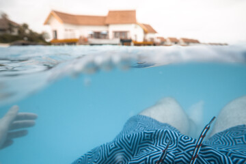 Man floats off Overwater Maldivian bungalow at luxury resort 