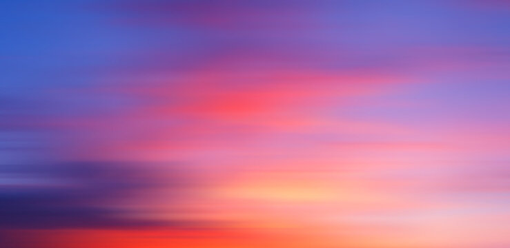 Colorful cloudy sky at sunset. Gradient color. Sky blur texture, abstract nature background motiom blur.