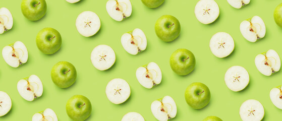 Fresh apples on green background. Pattern for design
