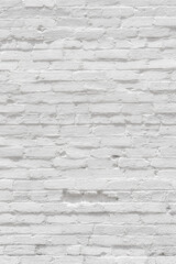 White painted brick wall with dent for texture or background. Aged bricks