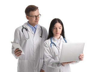 Medical assistants with laptop and tablet computer on white background