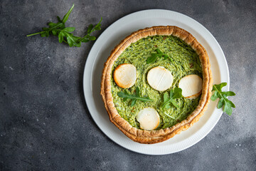 spinach savory pie green filling cheese fresh healthy meal food snack diet on the table copy space...