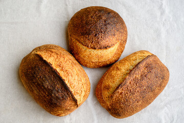 Three homemade sourdough breads.