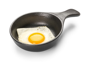 Frying pan with tasty egg isolated on white background