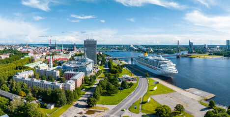 Aerial view of the large cruise ship docked in Riga port, Latvia near the old town and city center.