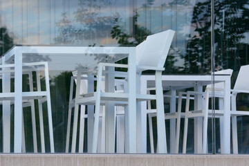 White gastronomy furniture, outside, abstract
