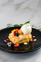 puff pastry cake with ice cream and fresh berries