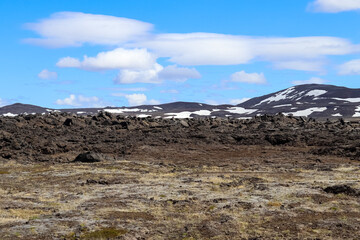 The volcanic landscape around Leirhnjukur volcano in Iceland - sulphur, rocks and wasteland.