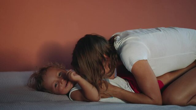 Happy mother with little son. He's such a happy little soul