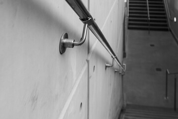 Staircase close up, concrete made building with steel handrail details,