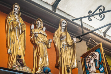 Fototapeta premium Tijuana, Mexico - AUGUST 2, 2012 - objects of devotion to Dia de Lod Muertos in the municipal market