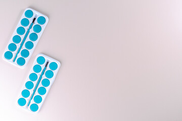 Top view of an artistic set of watercolors.