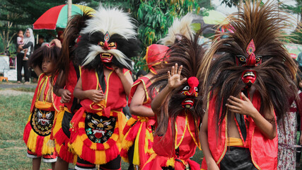 Reog line of traditional dancers from Ponorogo, Indonesia. named 