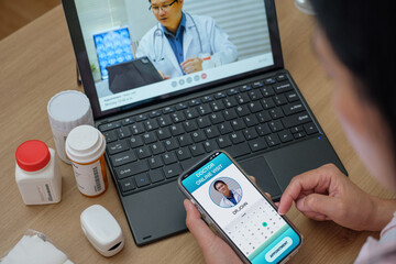 asian woman appointment consulting doctor visit on mobile app at home.telemedicine