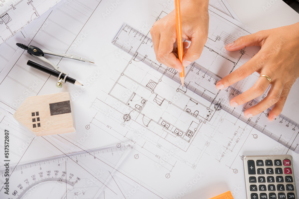 Poster architectural project workspace. top view of architect drawing with ruler on house plan blueprint pa