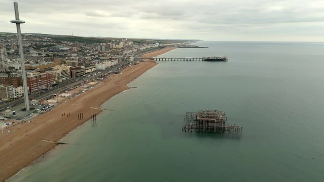 Aerial drone video Brighton West Pier beach UK 4k circa July 2022