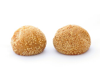 Deep-fried dough ball with sesame and mashed beans inside on white background