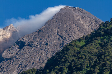 Close up of the crater of Mount Merapi, which is slightly covered in fog