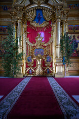 KOLOMNA, RUSSIA - 18 JUNE, 2022: Golden interior of the medieval Orthodox Assumption Cathedral with icons and images of saints in Kolomna, Russia