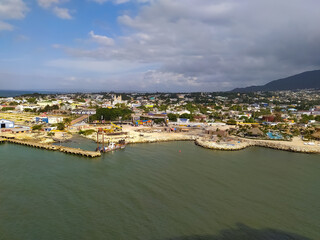 Ships, boats, containers, Puerto Plata harbor, port and cityscape of the industrial zone, Dominican Republic