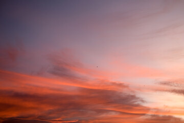 Fototapeta premium Beautiful cloudy sunset sky. Stunning sunset sky background. Sunset sky wallpaper. Banda Aceh, Indonesia.