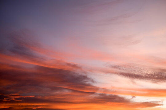 Beautiful cloudy sunset sky. Stunning sunset sky background. Sunset sky wallpaper. Banda Aceh, Indonesia.