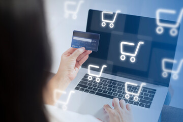 shopper using laptop online shopping. And using credit card online payment option or digital wallet online transaction.