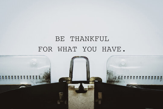 &ldquo;Be thankful for what you have&rdquo;words typed on a vintage typewriter.