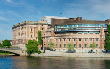 Fototapeta na wymiar Riksdagshuset, the Swedish Parliament House, located on the island of Helgeandsholmen, Old town, or Gamla Stan, Stockholm, Sweden, in a summer day