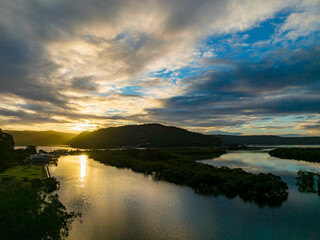 Rainy day sunset with clouds at the waterfront