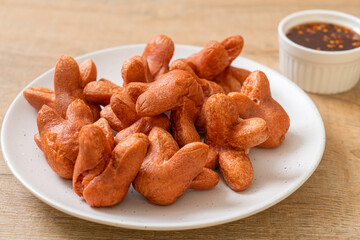fried sausage with dipping sauce