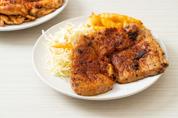 grilled spicy barbecue pork steak with french fries
