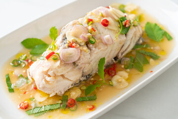 steamed sea bass fish with herbs