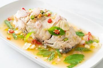 steamed sea bass fish with herbs
