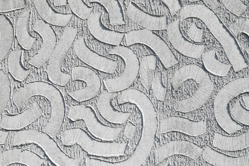 white wall with geometric and abstract surface, texture of the stone and the wall, no person