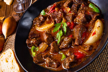 classic beef goulash with peppers and onions