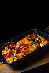 fried chicken legs with various vegetables