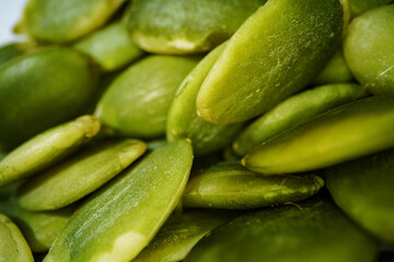 Macro photo of pumpkin seeds texture background