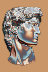 Gypsum copy of head statue David in bright neon colors for artists isolated on a beige background....