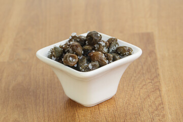 Salted marinated capers snack appetiser