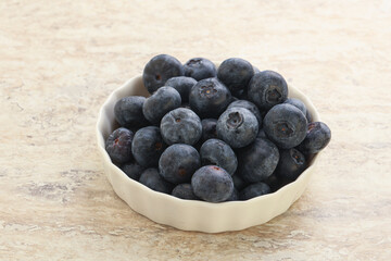 Sweet ripe blueberry heap in the bowl